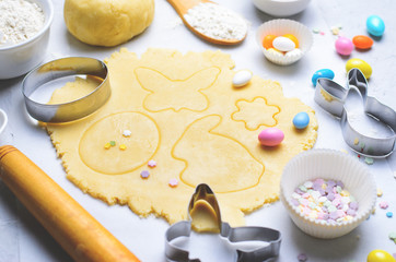Making of Easter Cookies, Baking Background, Dough, Cookie Cutters, Sugar Sprinkles