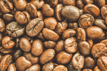 Roasted coffee beans closeup texture background