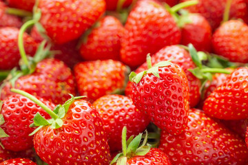 Fresh organic red ripe Strawberry fruit background closeup