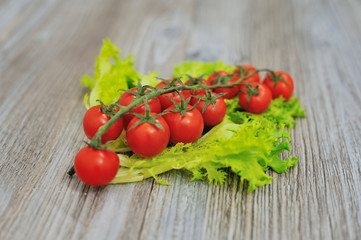 Cherry tomatoes isolated over white background