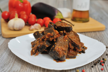 Pickled stuffed eggplant with vegetables