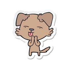 sticker of a cartoon dog sticking out tongue