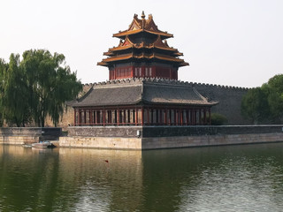 Fototapeta premium view of a corner tower in beijing's forbidden city