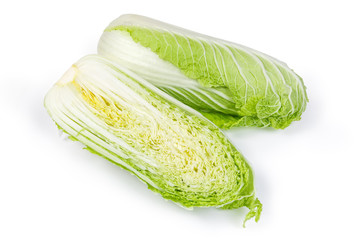 Two halves of napa cabbage head on a white background