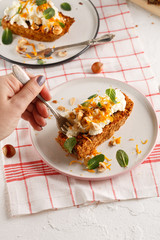 carrot fruit cake with nuts and cream