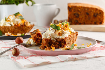 carrot fruit cake with nuts and cream