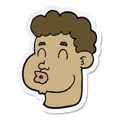 sticker of a cartoon male face
