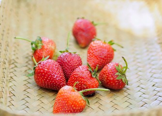 fresh strawberries on wooden table