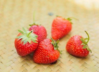 strawberries on wooden background