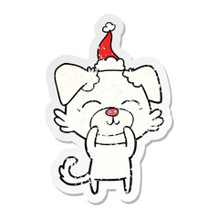 distressed sticker cartoon of a dog wearing santa hat
