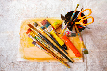 Well-worn collection of artistic bits, tools and supplies