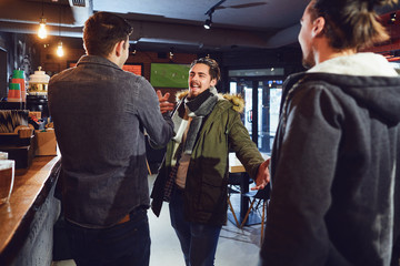 Meeting friends at the bar.