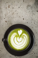 A cup of green tea matcha latte for background                      