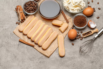 Ingredients for traditional tiramisu cake on concrete background