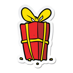 sticker of a cartoon xmas present