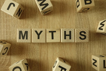Myths word from wooden blocks on desk