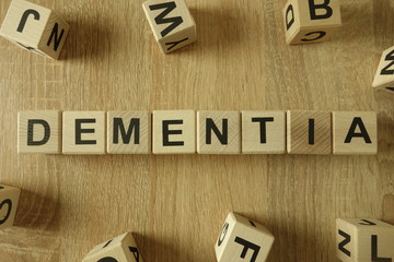 Dementia word from wooden blocks on desk