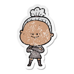 distressed sticker of a cartoon happy old woman
