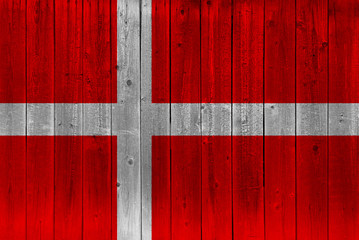 Denmark flag painted on old wood plank