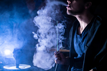 close up hookah in dark smoked place b