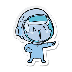 sticker of a happy cartoon astronaut pointing