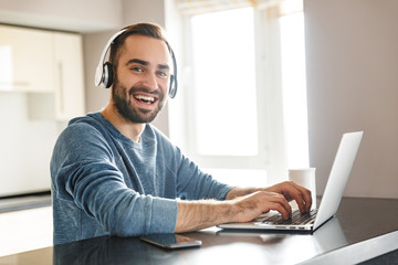 Happy handsome man freelancer