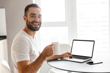 Happy handsome man freelancer