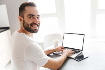 Happy handsome man freelancer
