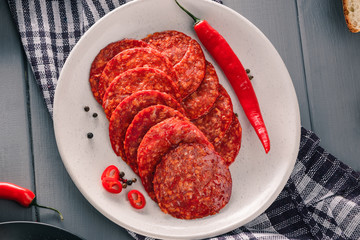 Pepperoni slices with chili pepper