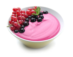 Bowl with tasty acai smoothie on white background