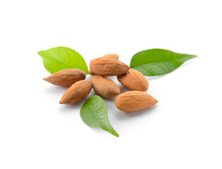 Tasty almonds on white background