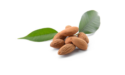 Tasty almonds on white background