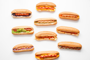 Tasty hot dogs on white background