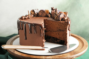 Tasty chocolate cake on table