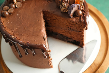 Tasty chocolate cake on table, closeup