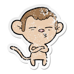 distressed sticker of a cartoon suspicious monkey
