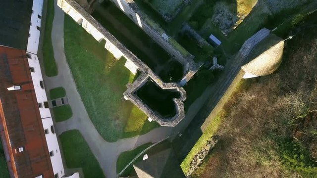 LOCE, SLOVENIA, 2019.01.25: Aerial: Ancient ruins of Zice monastery. Filming remainings of ancient French monastery on beautiful sunny winter morning.