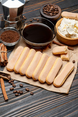 Tiramisu cake cooking - Savoiardi ladyfingers Biscuits, cheese and coffee