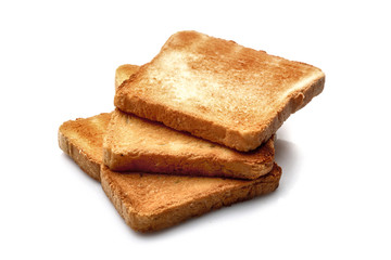 Slices of toasted bread on white background