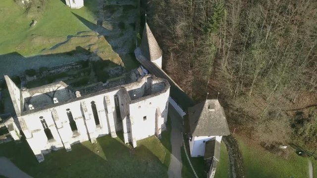 LOCE, SLOVENIA, 2019.01.25: Aerial: Ancient ruins of Zice monastery. Filming remainings of ancient French monastery on beautiful sunny winter morning.