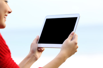 Woman holding blank tablet screen mockup