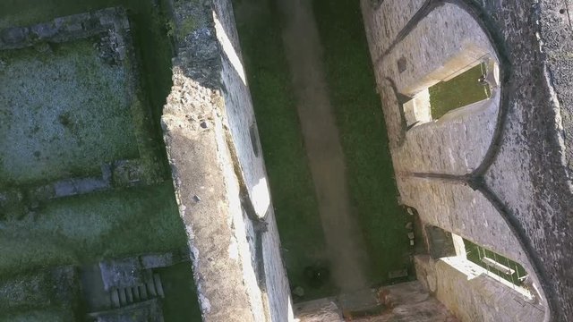 LOCE, SLOVENIA, 2019.01.25: Aerial: Flying over remainings of Zice monastery. Filming remainings of ancient French monastery Zicka kartuzija on beautiful sunny winter morning.