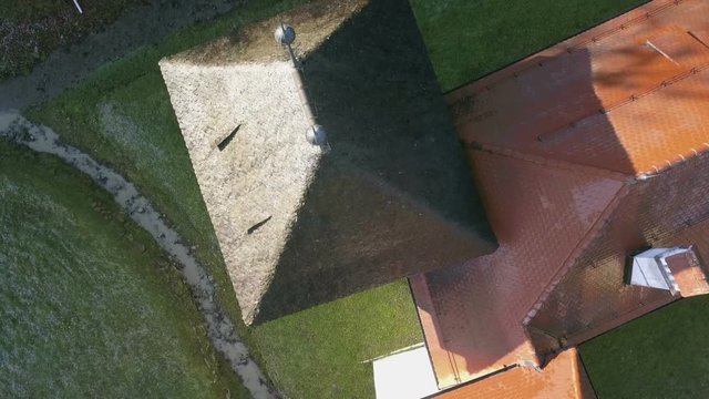 LOCE, SLOVENIA, 2019.01.25: Aerial: Flying over remainings of Zice monastery. Filming remainings of ancient French monastery Zicka kartuzija on beautiful sunny winter morning.
