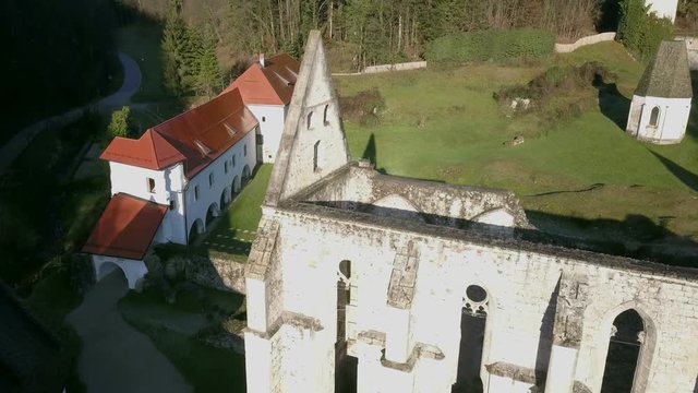 LOCE, SLOVENIA, 2019.01.25: Aerial: Ancient ruins of Zice monastery. Filming remainings of ancient French monastery on beautiful sunny winter morning.