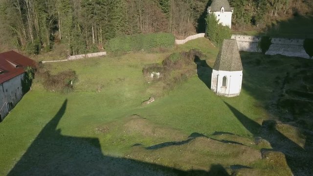 LOCE, SLOVENIA, 2019.01.25: Aerial: Ancient ruins of Zice monastery. Filming remainings of ancient French monastery on beautiful sunny winter morning.