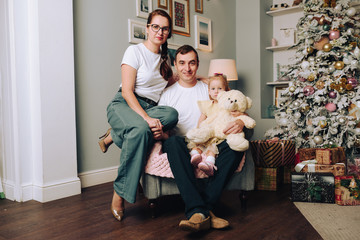 Fototapeta na wymiar happy family posing at home 