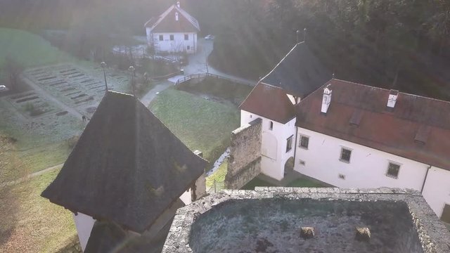 LOCE, SLOVENIA, 2019.01.25: Aerial: Ancient ruins of Zice monastery. Filming remainings of ancient French monastery on beautiful sunny winter morning.