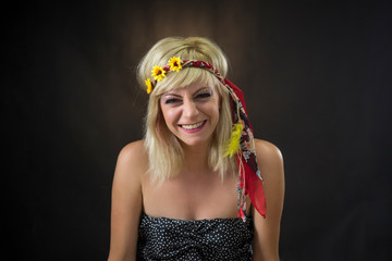 portrait of beautiful young woman wearing hippie headband