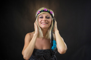 portrait of beautiful young woman wearing hippie headband