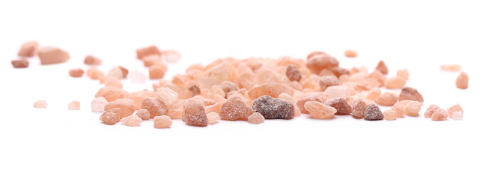 Himalayan salt grains isolated on white background